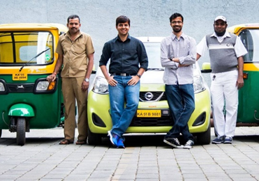 people standing in front of an auto